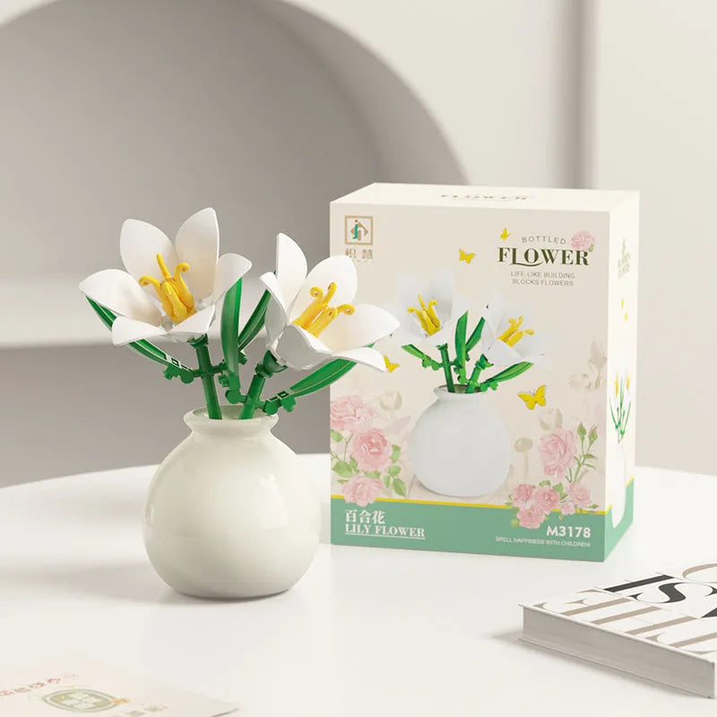 Assembled plastic building block flower in vase on tabletop