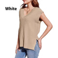 Camel and white loose v-neck sleeveless vest with striped or plaid pattern.