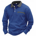 Man wearing a long-sleeved waffle-texture polo shirt in a solid colour with an asymmetric design detail.