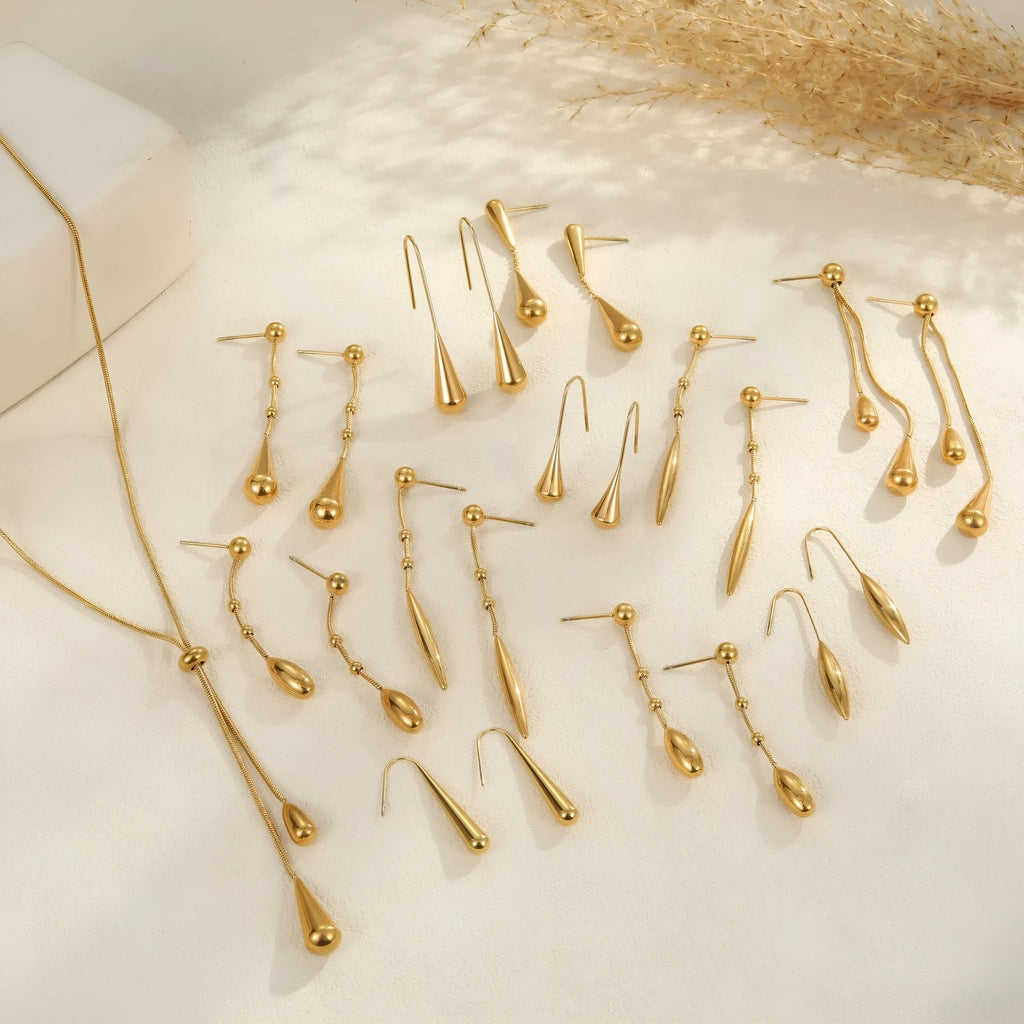 Stainless steel tassel water drop earrings with Y-word chain ornament in 18K gold electroplated finish, geometric drop-shaped design