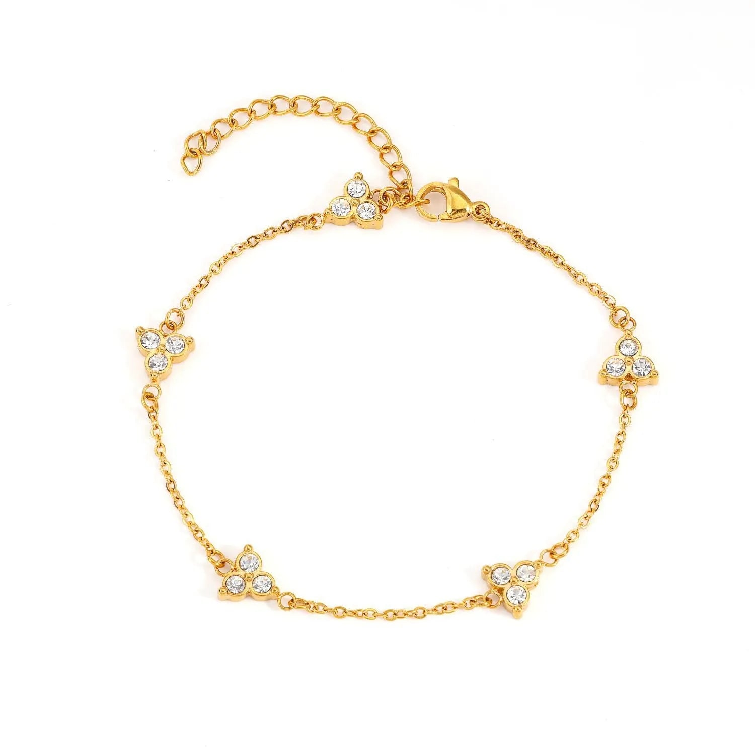 Women's stainless steel geometric bracelet with triangle design and three-diamond centrepiece in gold or steel finish.