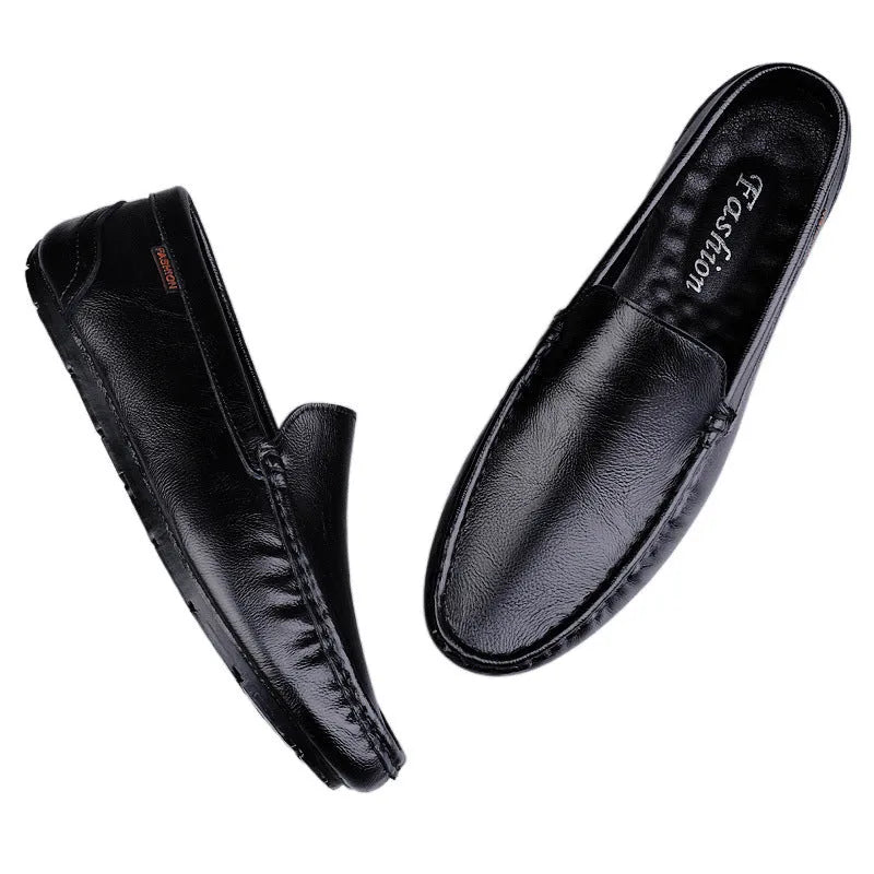 Men's casual soft leather shoes in black with visible sewing thread detail, two-layer cowhide upper, rubber sole, Korean style