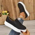 Women's round-toe thick platform sole flats in black, PU upper, elastic band, side view