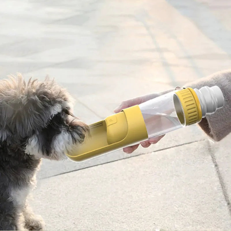 Portable dog water bottle with integrated bowl in dark blue, white, or yellow colours