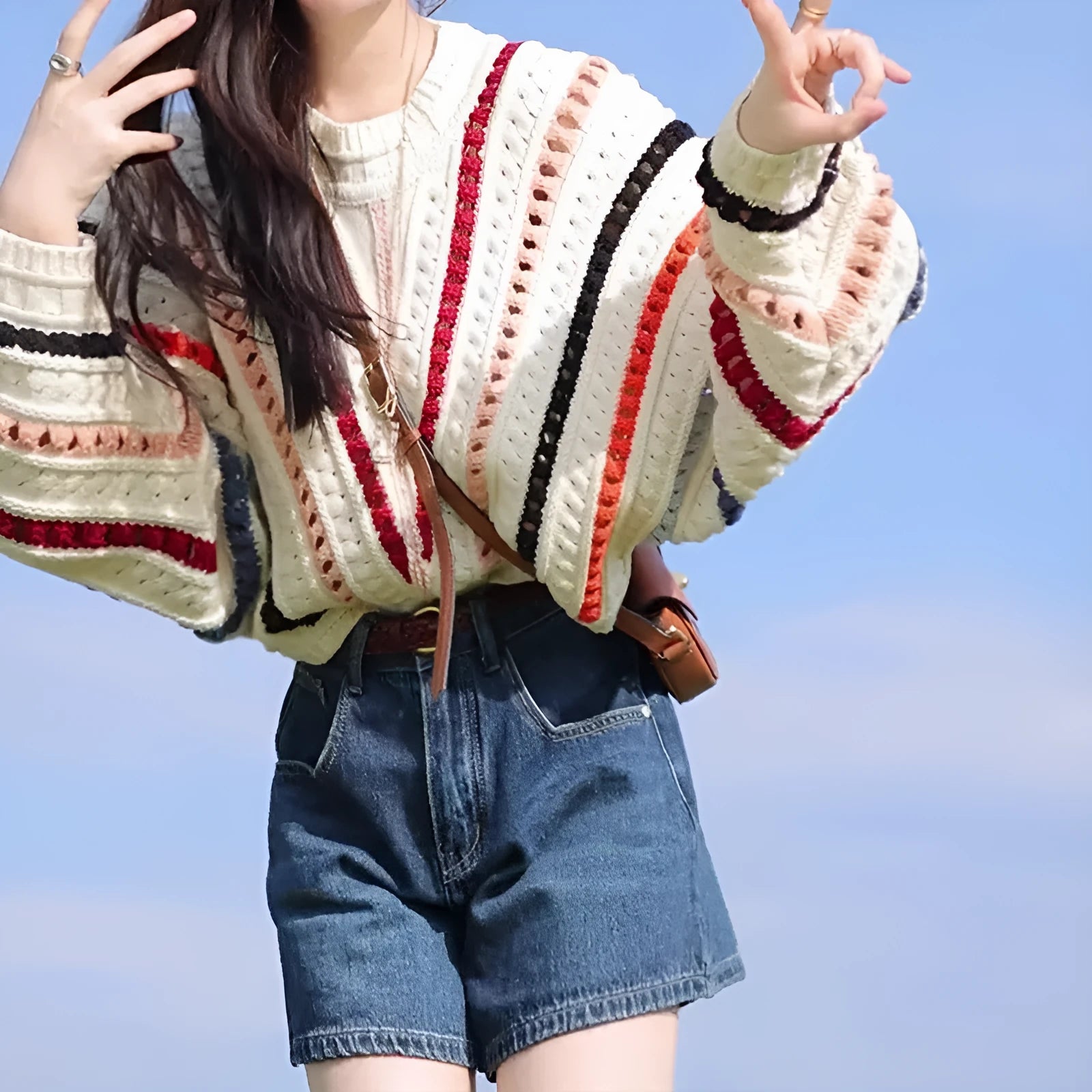 Rainbow striped batwing sleeve pullover sweater with round neck and loose fit