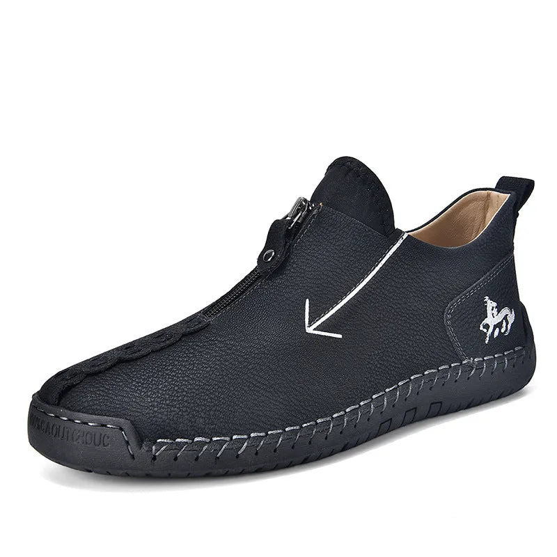Men's black leather-look casual boot with front zipper, round toe, and mid-calf shaft.