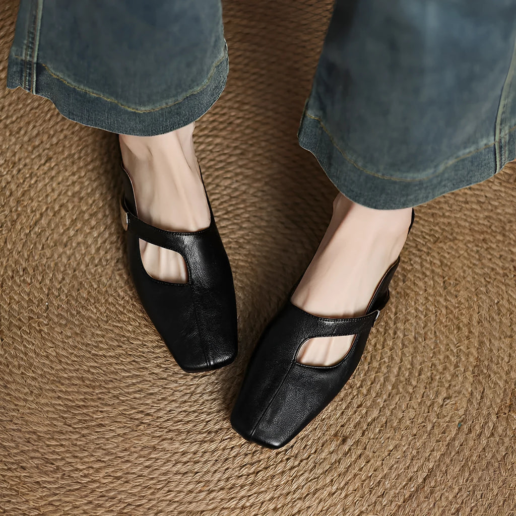 Pair of low heel outdoor slippers with a square toe in a solid colour