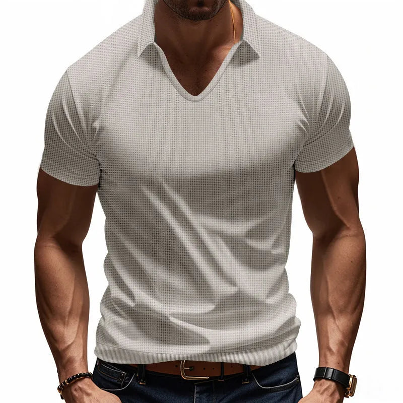 Men's loose fit V-neck t-shirt in cotton blend fabric showing short sleeves and solid colour design