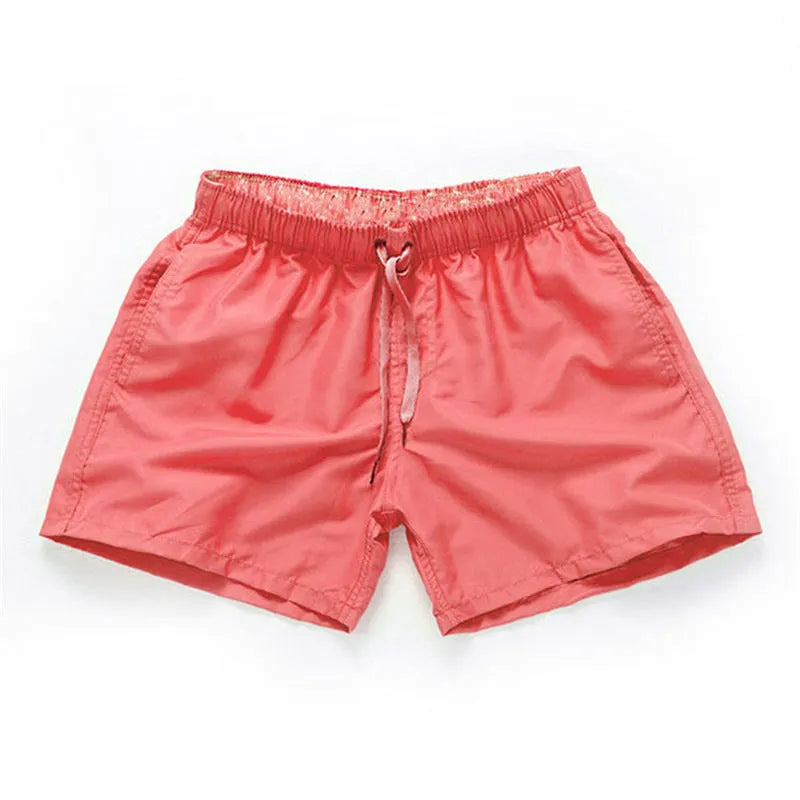 Men's straight leg polyester board shorts on a hanger, available in multiple colours and plus sizes.