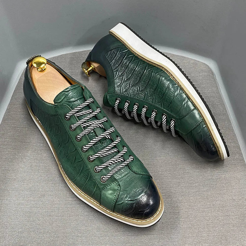 Men's low-top handmade casual shoes with an embossed pattern and front lace closure.