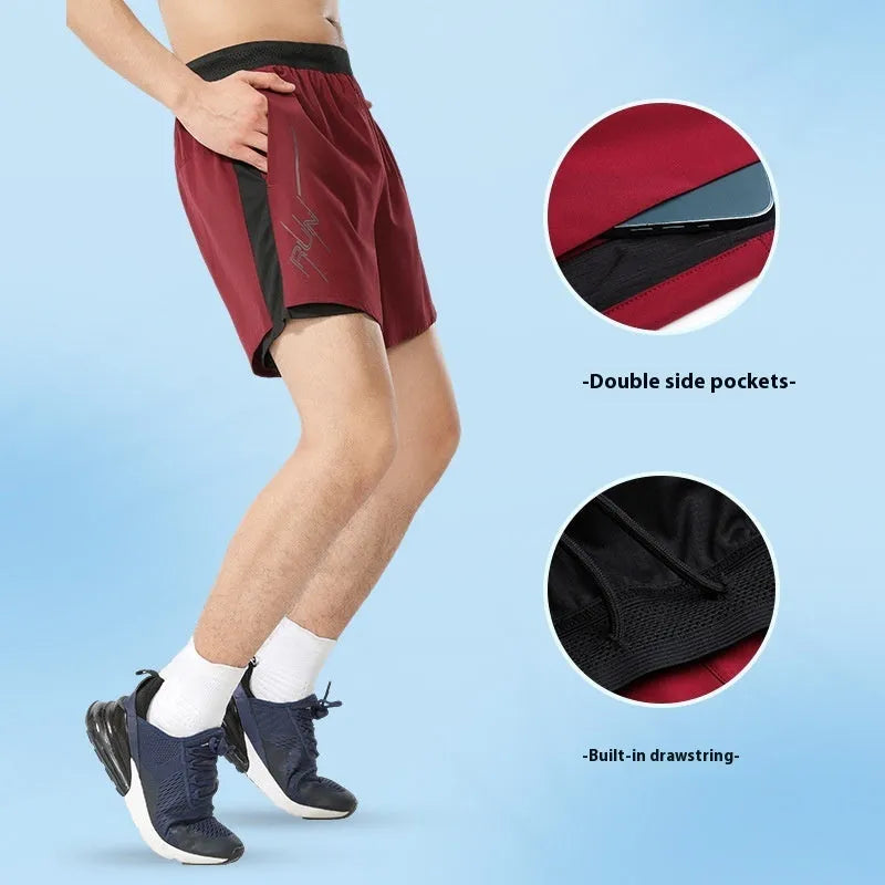 Men's solid colour polyester basketball shorts with low waist design on a neutral background.