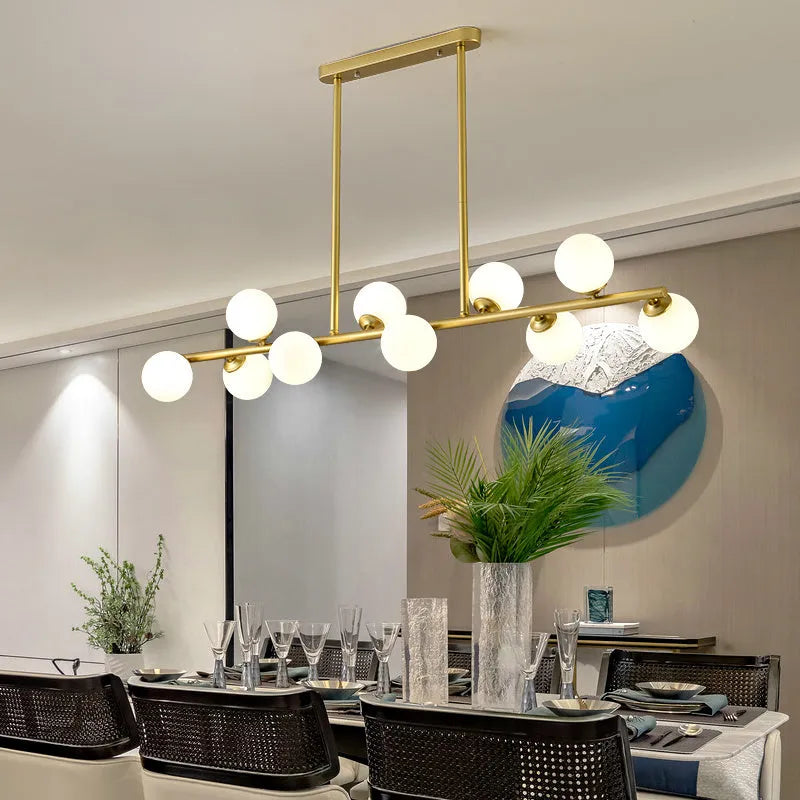 Modern minimalist glass bubble ball chandelier with black iron body and clear glass shades in a Nordic style
