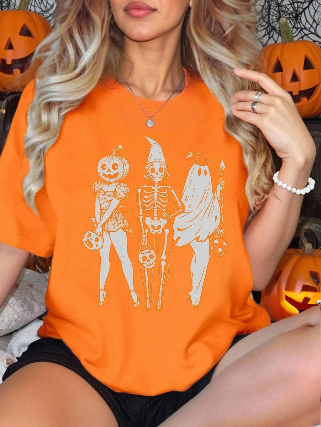 Loose fit cotton short sleeve T-shirt in assorted colours on a hanger