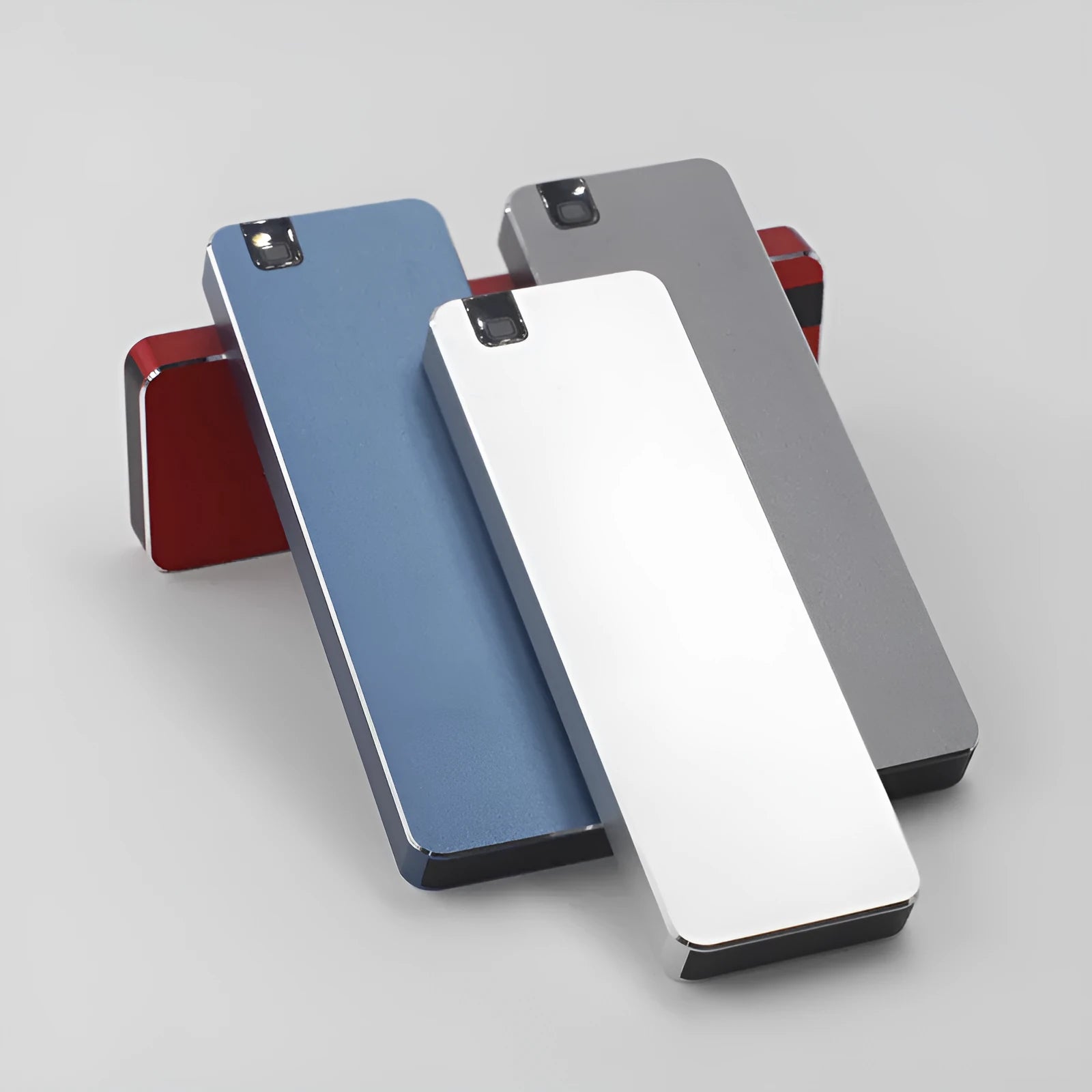 Portable metal external solid state hard drive with USB cable in multiple colour options