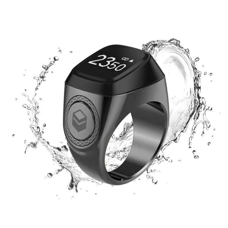 Zikr1 metal smart ring with OLED screen on a finger, showing a Tasbih count.