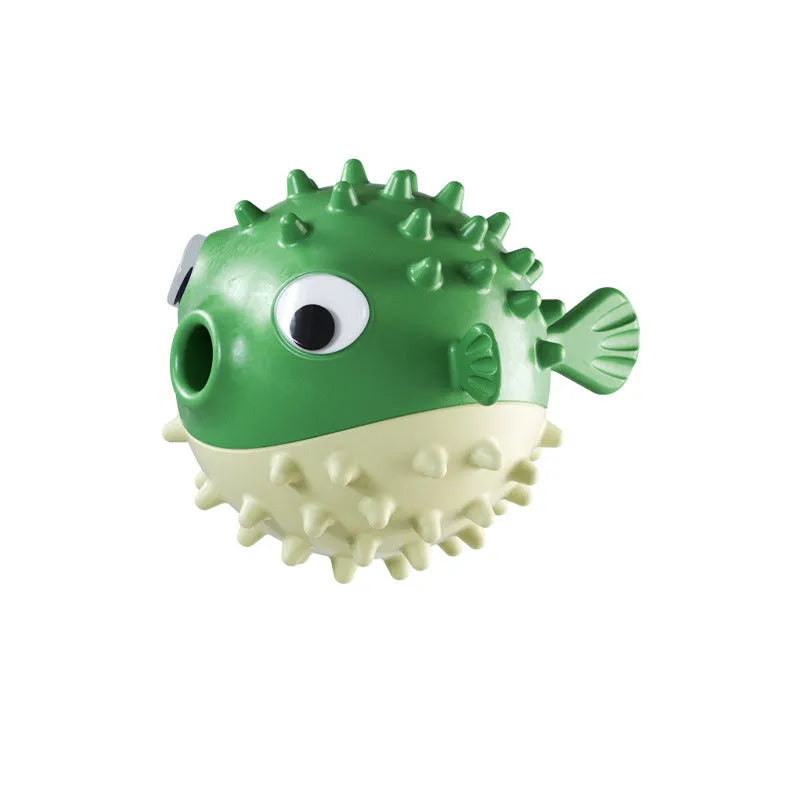 TPR fish-shaped interactive dog chew toy with treat dispensing hole and textured surface