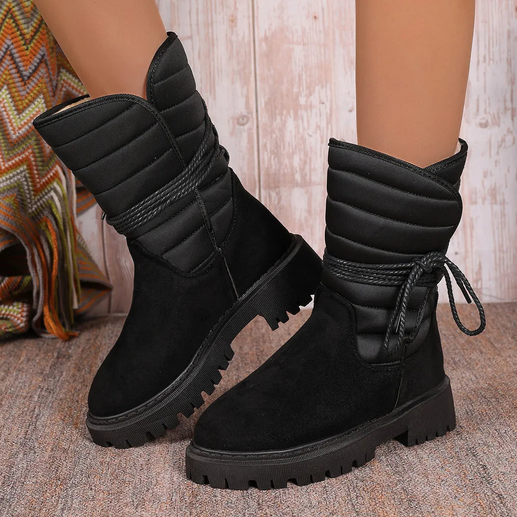 Women's black suede chunky heel snow boots with lace-up high-top and fleece lining.