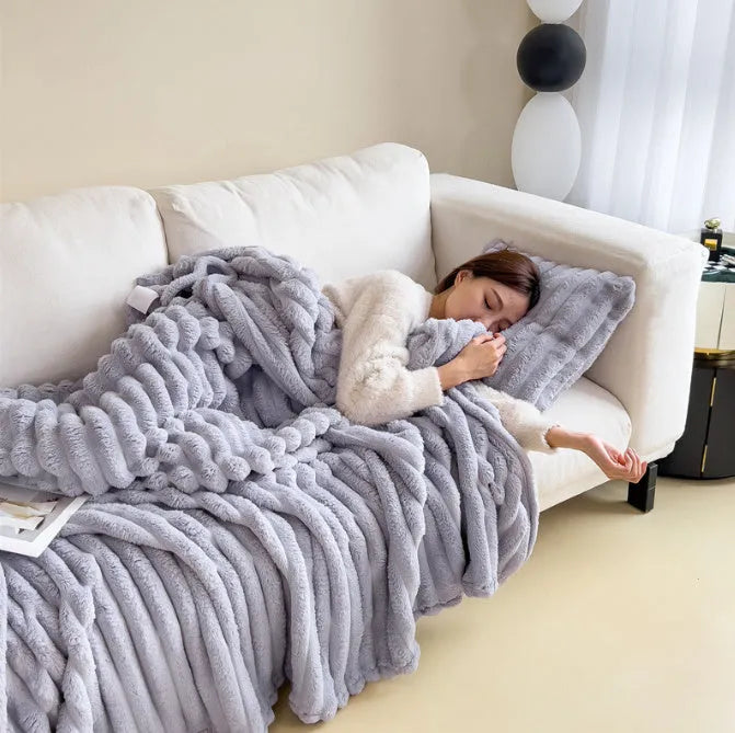 Soft wind bubble velvet faux rabbit fur blanket in a solid colour, showing double-sided thickening texture.