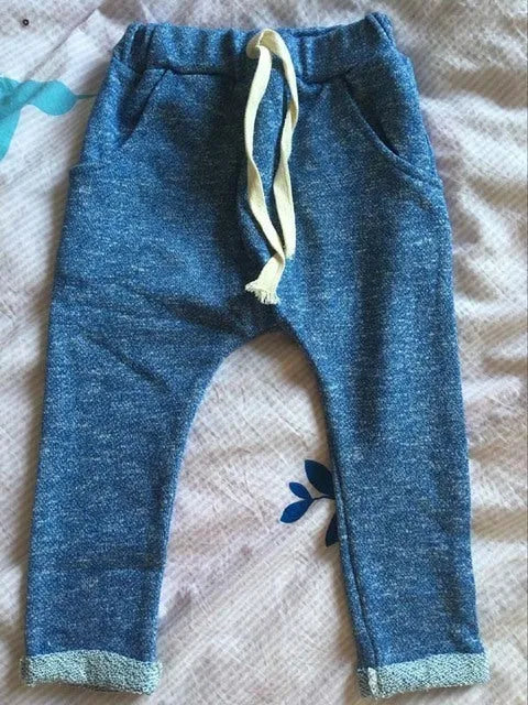 Fashion children cropped trousers for baby girls and boys, sizes 2T to 6, in blue colour.