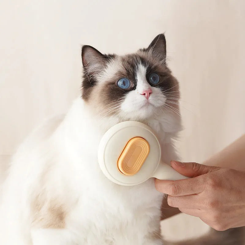 Cat grooming brush with stainless steel comb teeth and non-slip green or yellow handle