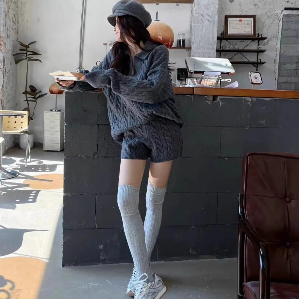 Women's knitted suit set with cable knit pattern jumper and elastic waist shorts in solid colour