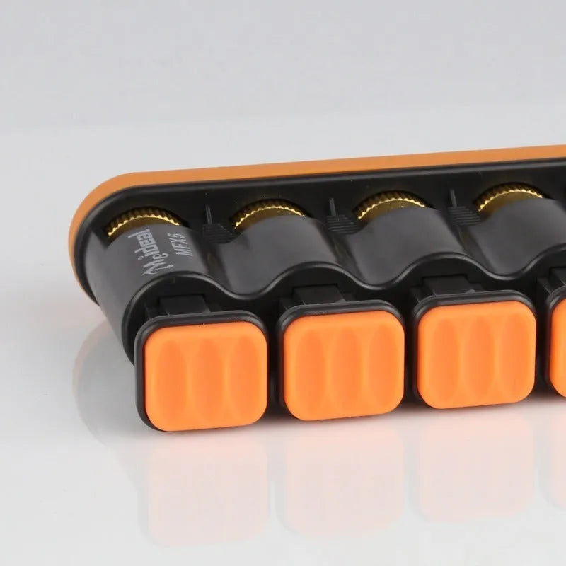 Grey and orange silicone finger exercise tool for musicians and climbers.
