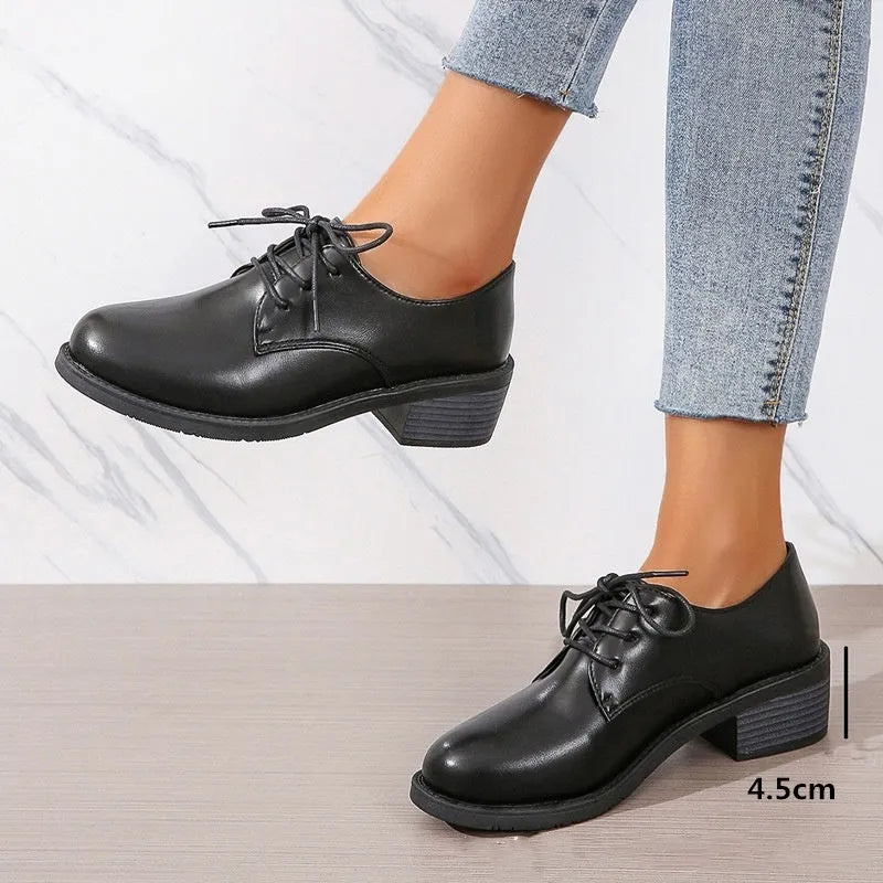 Black women's work shoes with thick chunky heel and professional PU leather upper