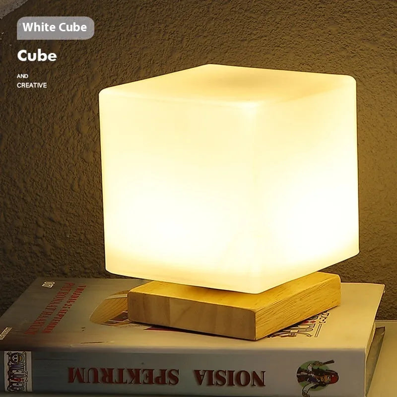 Nordic solid wood USB table lamp in cube style with touch dimming control on wooden desk