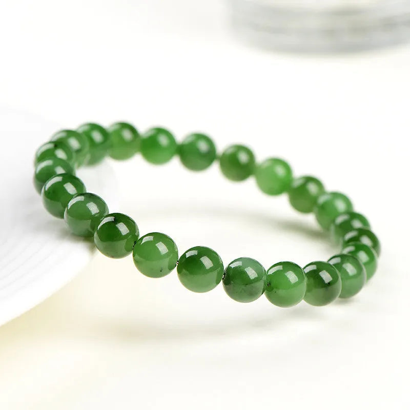 Natural Jasper and Hetian jade bead bracelet showing polished stone beads in one of five available sizes.