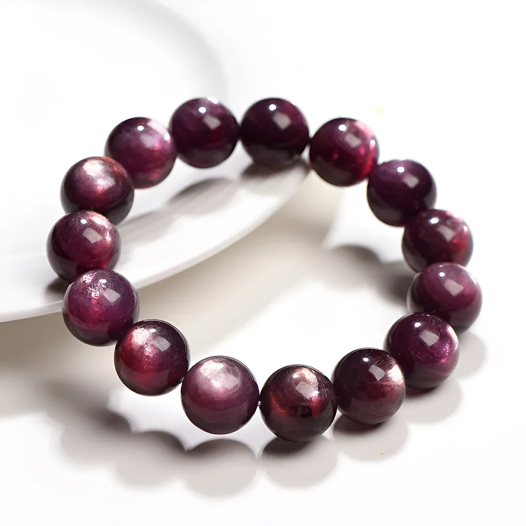 Purple lepidolite crystal bracelet with round polished beads, showing five different bead size options.