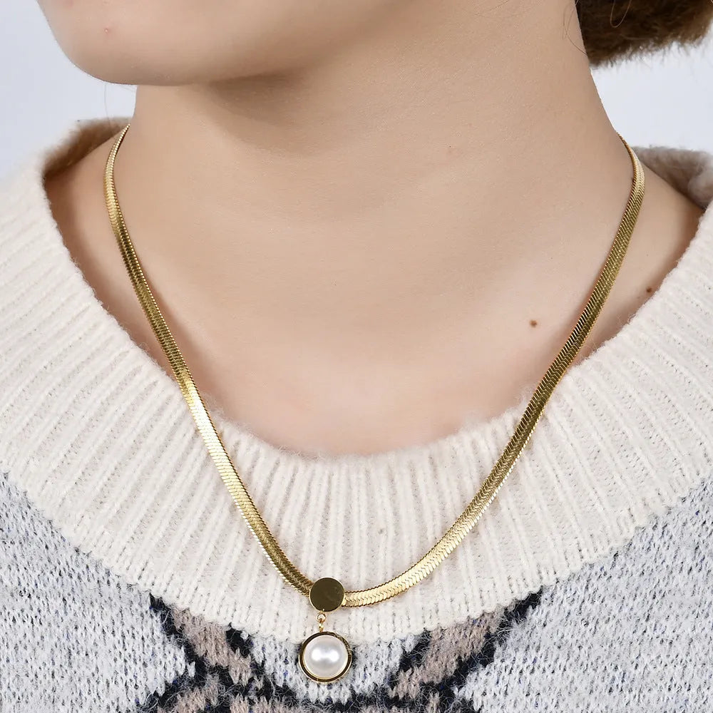 8mm flat snake blade necklace in titanium steel with geometric round element, available in steel colour