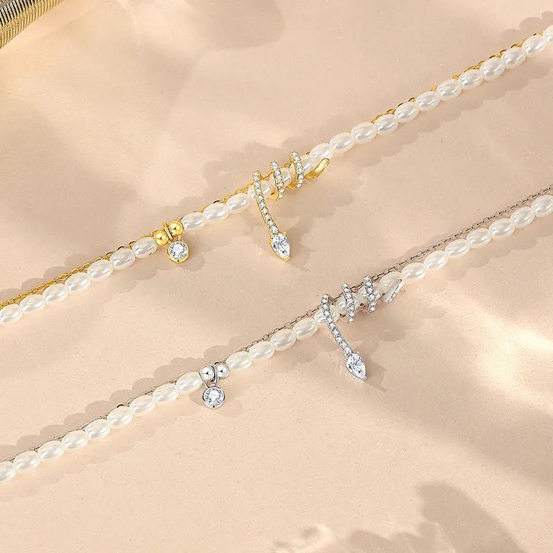 Women's snake motif beaded bracelet in 925 silver with gold or white gold colour finish.
