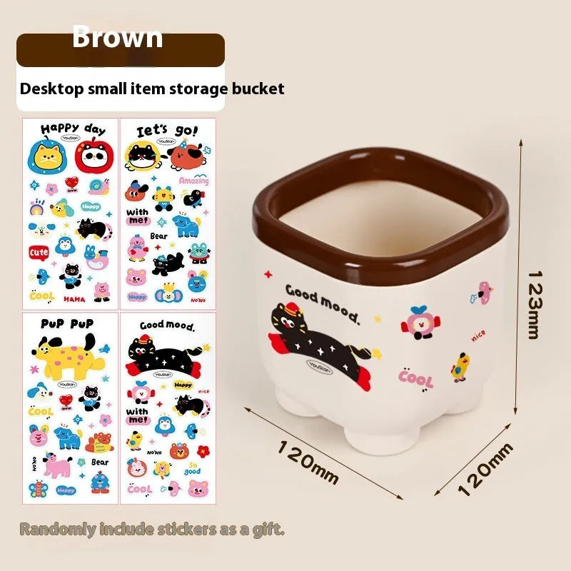 Cartoon-style red and brown plastic desktop storage organiser with 2L capacity and organisation stickers.