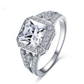 Women's geometric zircon ring with hollow design and platinum colour finish showing quadrilateral decorative elements