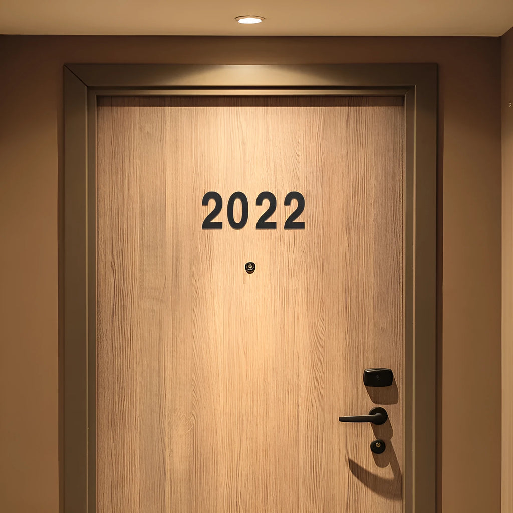 Black stainless steel adhesive house number sign measuring 7.5cm with waterproof construction