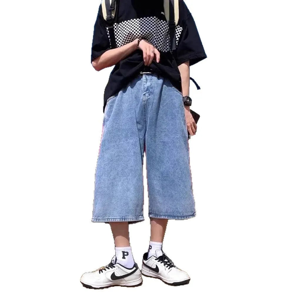 Men's washed light blue denim pirate shorts with a high waist and straight cropped legs on a plain background.