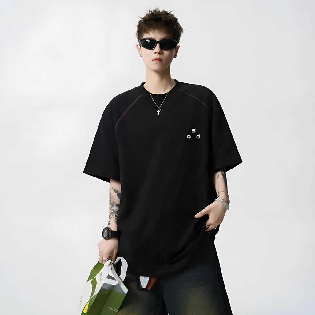 Cotton short-sleeve t-shirt with letter print design in loose fit showing round neck collar