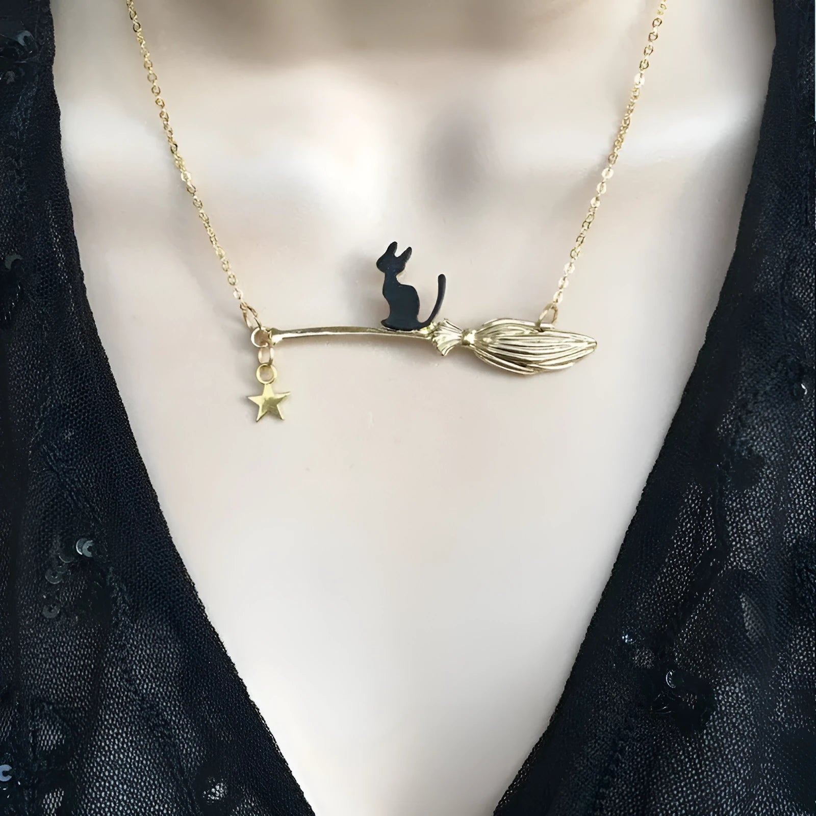 Black cat charm Halloween necklace in alloy metal with gold and silver colour options.