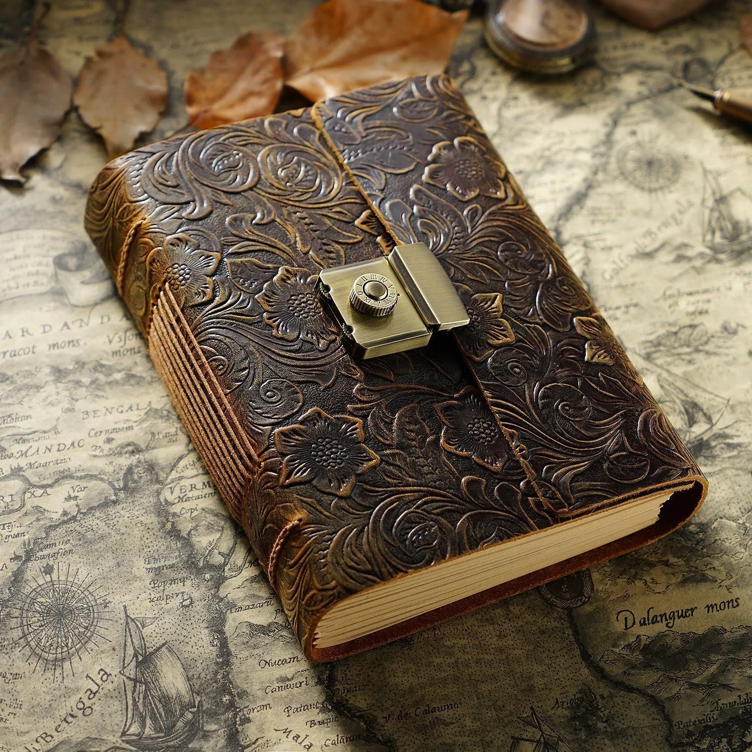 Vintage cowhide leather journal open on blank brown paper pages, A5 size, Crazy Horse brown colour with distressed finish