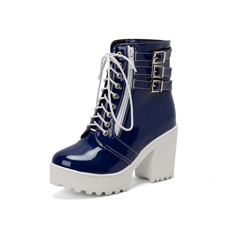 Women's black thick-heeled short boots with lace-up front and round toe on a waterproof platform.