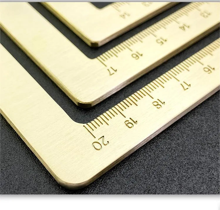 Solid brass calligraphy paper weight with carved square design for paper pressing