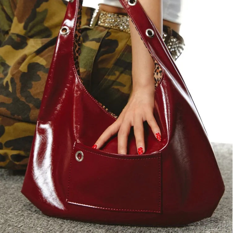 Red leopard print women's PU leather shoulder bag with dumpling shape.