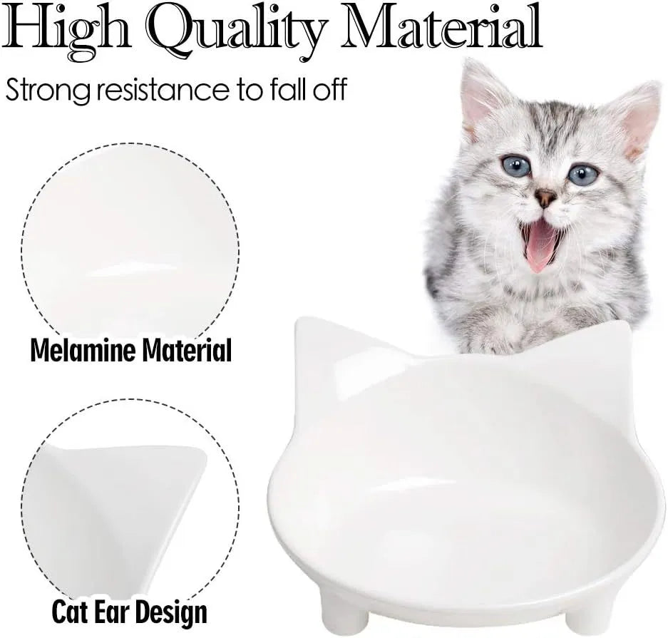 White shallow melamine pet bowl with non-slip black rubber base on a wooden floor.