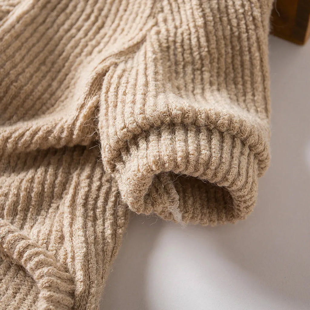 Brown cloth dog sweater pullover on a small dog, showing casual fit.