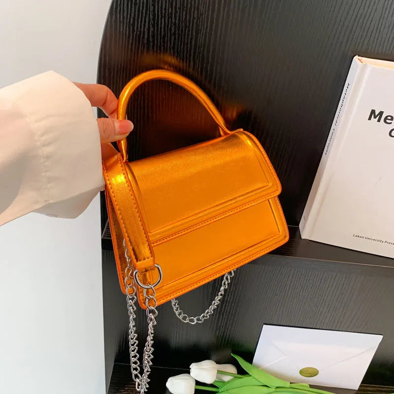 Retro PU crossbody shoulder bag in horizontal square shape showing sewing line details