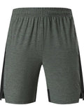 Men's casual spandex shorts in forest green with mid waist design and five-point construction