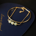 Women's Hetian jade lucky beads bracelet with gold inlay, shown in single, double, and three bead versions.