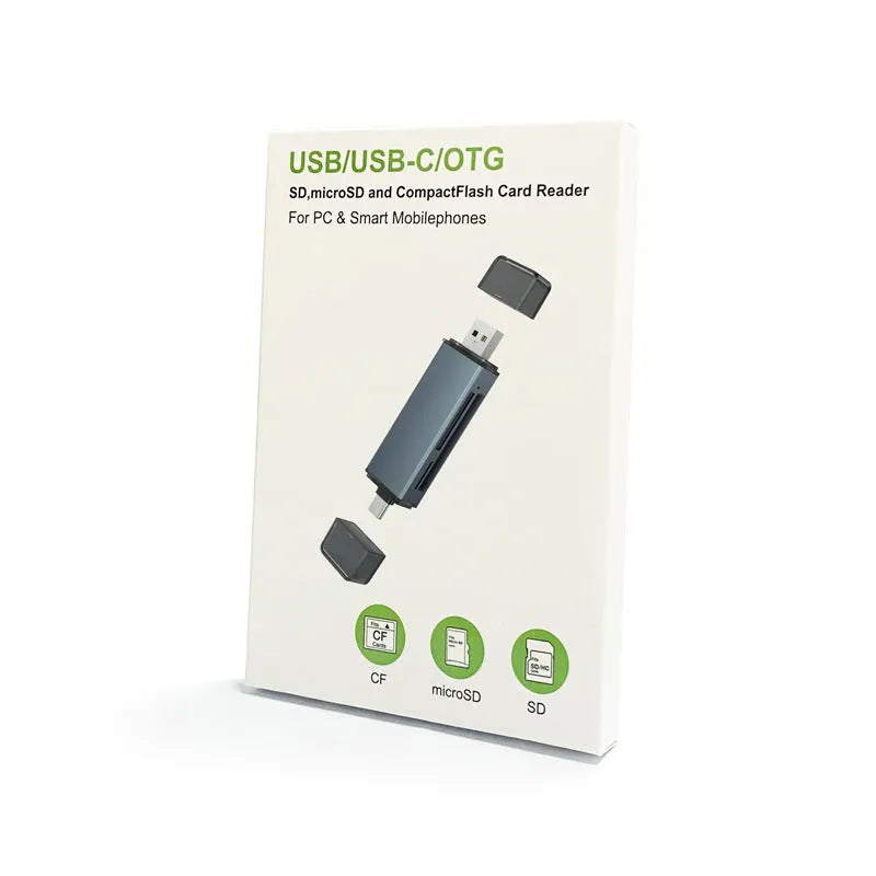 Compact aluminium USB card reader for CF, SD, and TF memory cards on a desk.