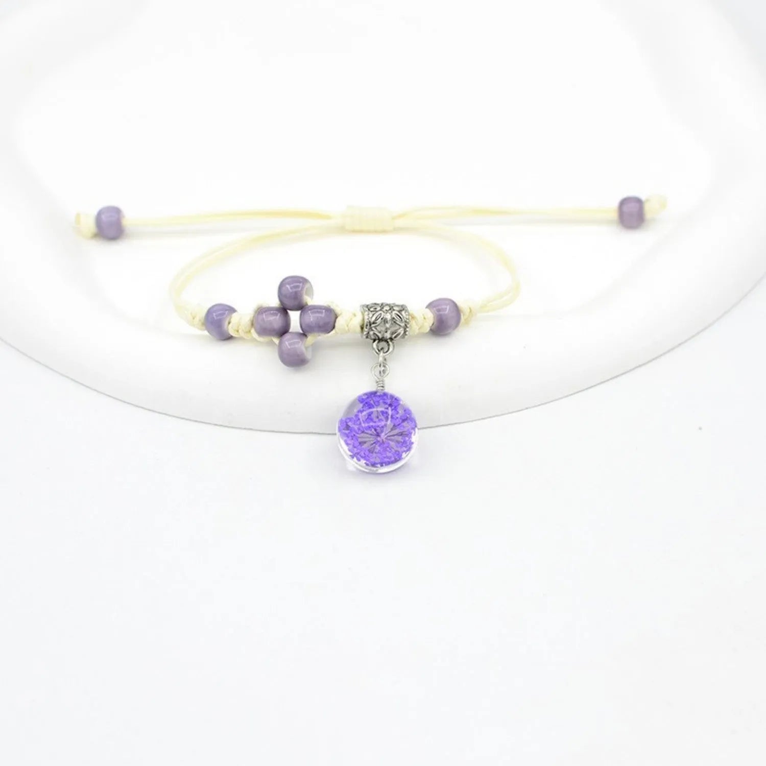 Women's hand-woven glass dried flower bracelet with large 1.4 cm beads in multiple colour options.