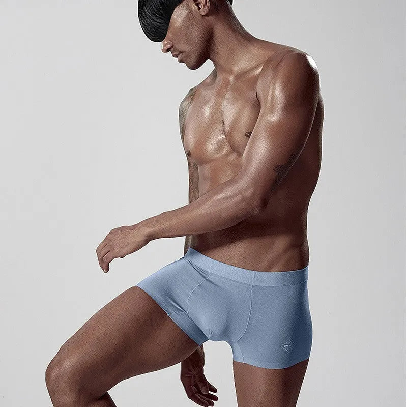 Seamless modal men's underwear in solid colours with mid-waist design for hip lifting and body shaping